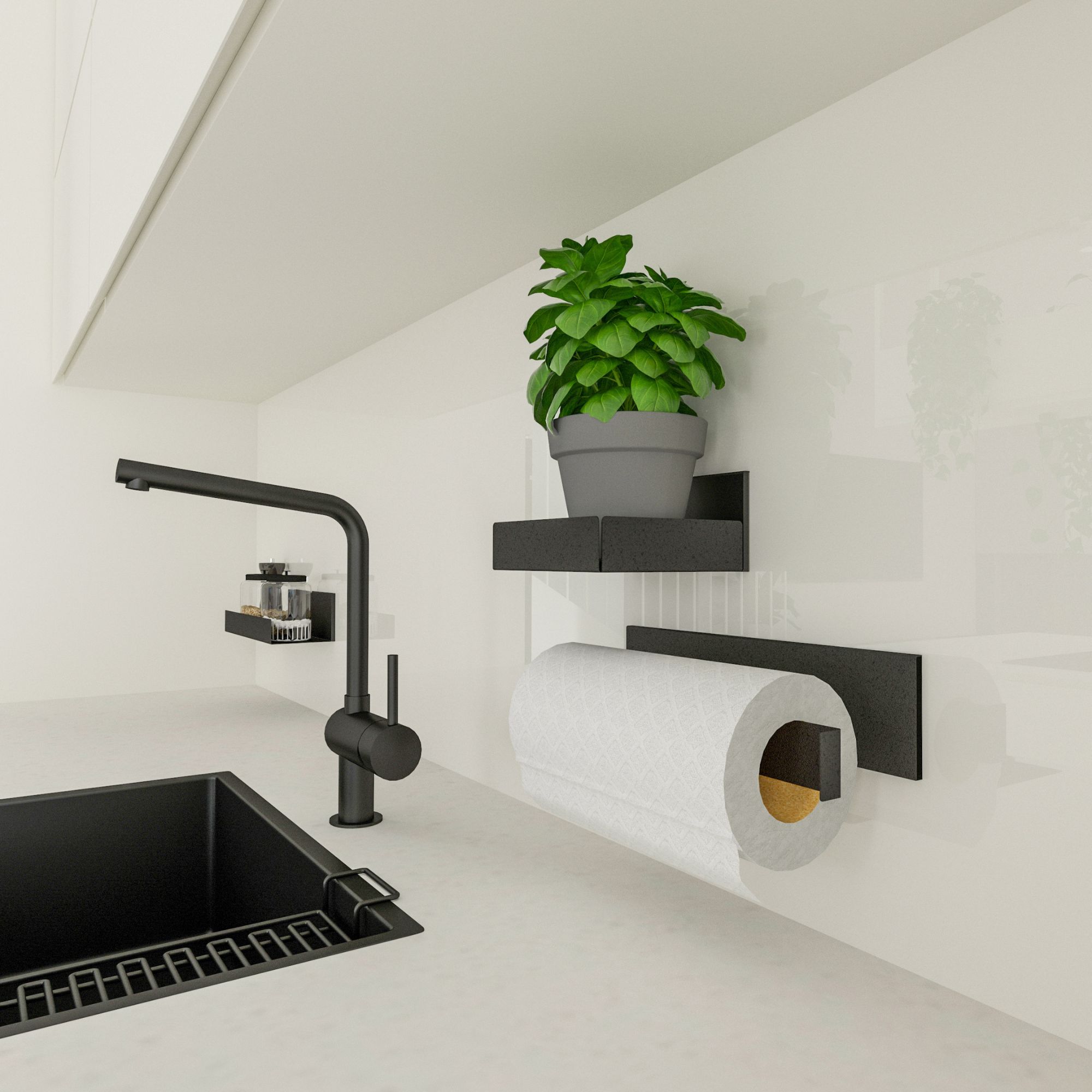 Kleine magnetische Metallbox mit Pflanze neben Küchenrollenhalter an einer hellen Rückwand